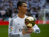 Нападающий мадридского футбольного клуба "Реал" Криштиану Роналду получит награду "Золотой мяч" ФИФА как лучший футболист мира по итогам 2014 года