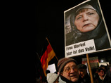 В Дрездене 25 тысяч антиисламистов вышли на демонстрацию с траурными флагами. В Берлине их назвали лицемерами
