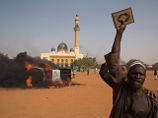 В столице Нигера мусульмане жгут церкви, протестуя против карикатур в Charlie Hebdo