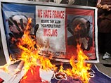 Митингующие в Пакистане сожгли чучело Олланда в знак протеста против карикатур на пророка Мухаммеда