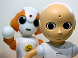 В Токио презентацию говорящих роботов-младенцев провели человекообразные дроиды