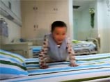 Зажигательный танец китайского мальчика с ампутированными ногами стал хитом в интернете Зажигательный танец китайского мальчика с ампутированными ногами стал хитом в интернете