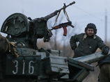 Киев завершит отвод вооружений к середине марта, сообщили в ОБСЕ