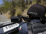 В Мексике задержали 13-летнего мальчика с автоматом Калашникова, пистолетом, патронами и 23 порциями марихуаны