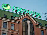 Чистая прибыль "Сбербанка" в прошлом году упала на четверть Чистая прибыль "Сбербанка" в прошлом году упала на четверть