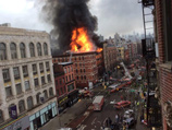 В Нью-Йорке здание на Манхеттене обвалилось и загорелось
