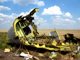 Место крушения самолета Боинг-777 в Донецкой области, 23 июля 2014 года Место крушения самолета Боинг-777 в Донецкой области, 23 июля 2014 года