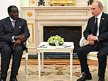 Президент России Владимир Путин в воскресенье встретился с президентом Зимбабве Робертом Мугабе