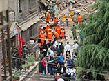 На юго-западе Китая обрушился 9-этажный жилой дом, под завалами могут находиться люди