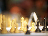 Президент Олимпийского комитета России (ОКР) Александр Жуков и глава Международной шахматной федерации (ФИДЕ) Кирсан Илюмжинов провели партию в парные шахматы