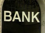 S&P: иностранные банки будут сокращать объемы операций в России и на Украине