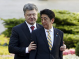 Порошенко договорился с премьером Японии о кредитных гарантиях на 1,5 млрд долларов