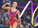 Сразу три медали высшего достоинства российской команде принесла Яна Кудрявцева. Она первенствовала в упражнениях с лентой, а также выиграла соревнования с булавами и с мячом