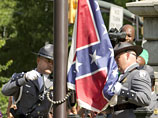 В Южной Каролине сняли флаг Конфедерации, на фоне которого фотографировался убийца 9 человек 