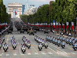 Масштабный военный парад прошел во вторник, 14 июля, на Елисейских полях в Париже по случаю главного национального праздника республики, установленного в память о событиях Великой французской революции