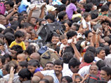 Число погибших во время давки на религиозном фестивале в городе Раджамандри в штате Андхра Прадеш на юго-восточном побережье Индии возросло с 27 до 29 человек