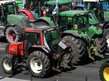 В понедельник, 20 июля, французские фермеры заблокировали тракторами все въезды и выезды в нормандском городе Кан