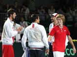 Игроки сборной России по теннису радуются победе в матче Кубка Дэвиса между сборными России и Испании