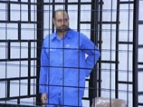 Суд в Ливии приговорил Саифа Аль-Ислама, сына Муаммара Каддафи, к расстрелу. Вместе с родственником диктатора приговор к смертной казни был вынесен еще восьми обвиняемым в военных преступлениях в ходе переворота 2011 года Суд в Ливии приговорил Саифа Аль-Ислама, сына Муаммара Каддафи, к расстрелу. Вместе с родственником диктатора приговор к смертной казни был вынесен еще восьми обвиняемым в военных преступлениях в ходе переворота 2011 года
