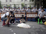 Сотни протестующих в Тайбэе требуют отставки министра образования после самоубийства студента