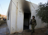 Неизвестные сожгли дом с палестинским младенцем на Западном берегу Иордана и оставили граффити о Мессии