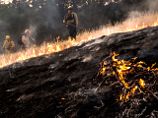 Лесные пожары в северной Калифорнии охватили более 18,5 тыс. гектаров и разрастаются, погиб пожарный