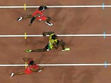 Шестикратный олимпийский чемпион Усэйн Болт из Ямайки выиграл золотую медаль в беге на 100 метров на первенстве мира по легкой атлетике в Пекине с результатом 9,79 секунды Шестикратный олимпийский чемпион Усэйн Болт из Ямайки выиграл золотую медаль в беге на 100 метров на первенстве мира по легкой атлетике в Пекине с результатом 9,79 секунды