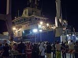 Среди задержанных - граждане Марокко, Ливии и Сирии. Они обвиняются в том, что управляли судном, в трюме которого были найдены мертвыми 52 иммигранта