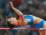 Мария Кучина (Россия) в прыжке в длину на чемпионате мира 2015 по легкой атлетике в Пекине