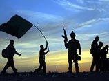 Российские, сирийские и иранские военные организовали в Багдаде координационный центр для сотрудничества с поддерживаемыми Ираном шиитскими ополченцами, борющимися с террористической организацией "Исламское государство" Российские, сирийские и иранские военные организовали в Багдаде координационный центр для сотрудничества с поддерживаемыми Ираном шиитскими ополченцами, борющимися с террористической организацией "Исламское государство"
