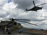 Телеканал "Россия 24" показал, как российские вертолеты наносят удары по позициям ИГ в Сирии