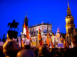 Тысячи человек вышли на антиисламский марш в Дрездене