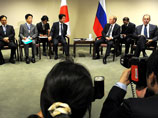 Япония готовит визит Путина до конца года, объявил генсек правительства