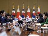 Власти Южной Кореи и Японии во время "примирительного саммита" договорились о взаимодействии по совместному решению проблемы проституции, ставшей причиной охлаждения отношений между государствами