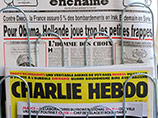 Charlie Hebdo опубликовал карикатуры о крушении российского самолета Charlie Hebdo опубликовал карикатуры о крушении российского самолета