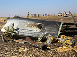 Самолет с останками жертв крушения А321 приземлился в Пулково