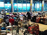 Прибывающий багаж временно размещают в московских аэропортах. Чемоданы, доставленные из Египта во Внуково, хранятся в залах прилета терминалов A и B из-за отсутствия места для складирования