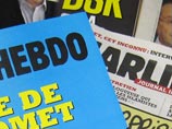Скандальный сатирический журнал Charlie Hebdo опубликовал вторую карикатуру, посвященную серии терактов в Париже. На сей раз издание выпустило специальный номер о недавней трагедии и поместила рисунок на обложку Скандальный сатирический журнал Charlie Hebdo опубликовал вторую карикатуру, посвященную серии терактов в Париже. На сей раз издание выпустило специальный номер о недавней трагедии и поместила рисунок на обложку