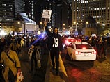 В Чикаго продолжаются акции протеста в связи с убийством чернокожего подростка белым полицейским. В пятницу, 27 ноября, активисты собираются выйти на марш на главную торговую магистраль города