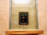 Французский ученый заявил, что обнаружил под знаменитым портретом Леонардо да Винчи "Мона Лиза" еще одно изображение