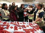 Первая группа сирийских беженцев прибыла накануне в Канаду. В нее вошли 163 человека