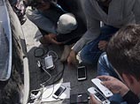 Власти Норвегии обнаружили фото отрезанных голов и символику ИГ в телефонах беженцев, утверждает пресса