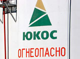 Обыски, прошедшие утром у сотрудников "Открытой России", связаны с подозрениями в легализации денежных средств, полученных Михаилом Ходорковским от продажи похищенной у дочерних структур ЮКОСа нефти