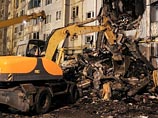 Тело четвертого погибшего в среду утром обнаружено при разборе завалов частично разрушенного в результате взрыва газа жилого девятиэтажного дома по улице Космонавтов в Волгограде
