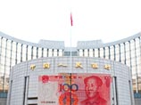 Китайский ЦБ снова понизил курс юаня