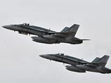 В налетах участвовали истребители-бомбардировщики F-18. В налетах участвовали истребители-бомбардировщики F-18.