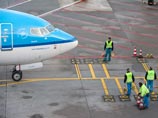 Пассажир самолета, летевшего из Амстердама в Пекин, ранил себя и пилота