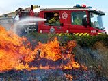 В Австралии лесной пожар уничтожил почти 100 домов в городке Ярлуп, трое пропали без вести 
