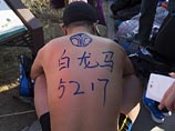 В Китае более тысячи жителей приняли участие в ежегодном "Голом забеге" (ФОТО)