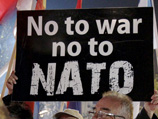 Пророссийская группа сербских оппозиционеров в Черногории, называющих себя Демократическим фронтом, провела в среду в Подгорице акцию протеста против возможного вступления страны в НАТО